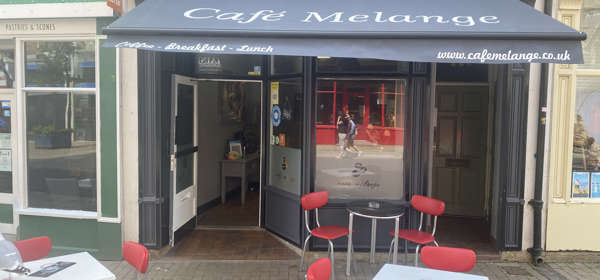 Tables and chairs outside Café Melange  