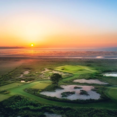 An aerial shot of Prince's golf course at sunset