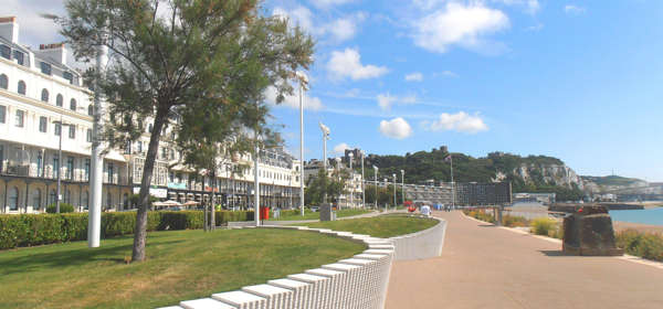 Dover Esplanade with Dover Castle and the port in the distance.