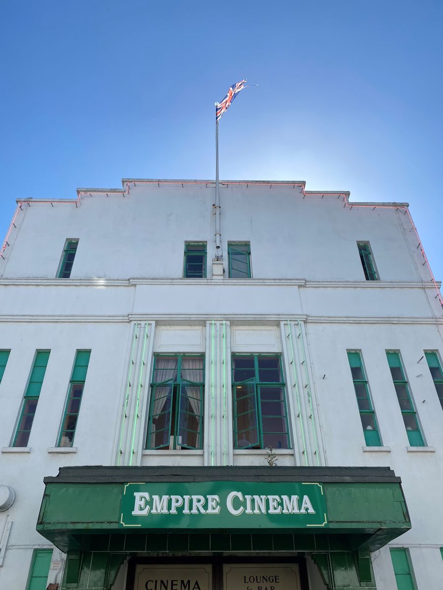 The white and green art-deco exterior of the Empire Cinema in Sandwich.