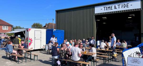 Summer outside drinking area with tables and chairs